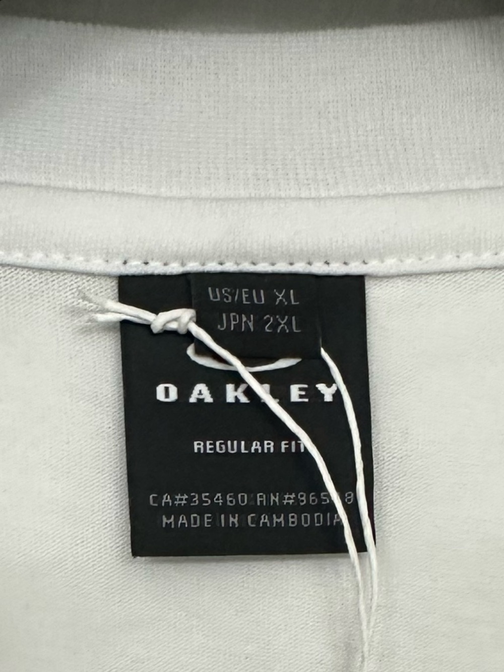 Oakley White Short-Sleeve Tee with Green Logo Graphic - Picture 3 of 3
